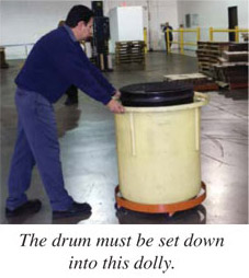 The drum must be set down into this dolly.