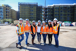 A group of seven female construction workers.