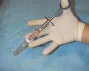 A one-handed safety syringe