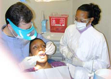 Dentists working on patient