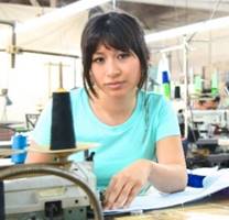 Worker at sewing machine