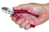 Hand holding a handle incorrectly.
