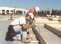 Two carpenters at commercial job site