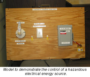 Model to demonstrate the control of a hazardous electrical energy source.