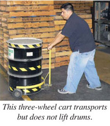 This three-wheel cart transports but does not lift drums