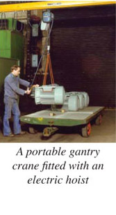 A portable gantry crane fitted with an electric hoist