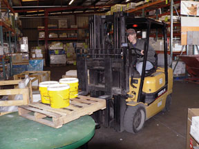 A guy driving a forklift