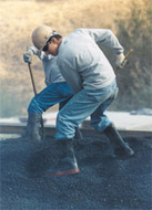 Laborer digging
