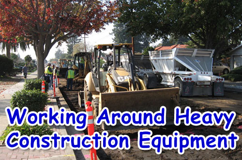 Youth Working Around Heavy Construction Equipment