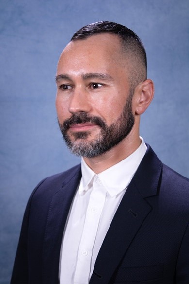 photo of Adam P. Romero.