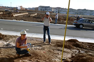 Construction site surveyors.
