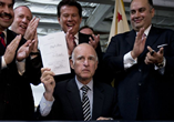 Gov. Jerry Brown signs bill into law for workers' compensation reform (Senate Bill 863).